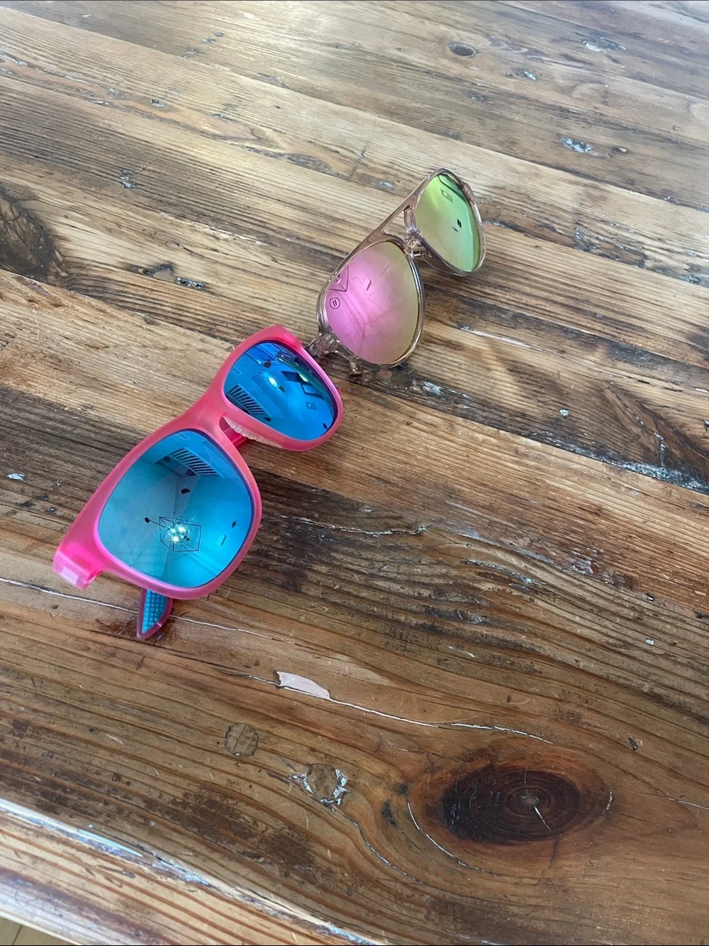 2 sunglasses Goodr and Blenders